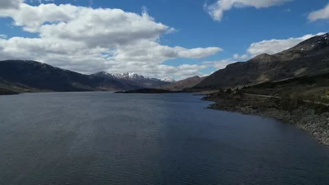 Slow rising flight over lake Stock Footage 334384206