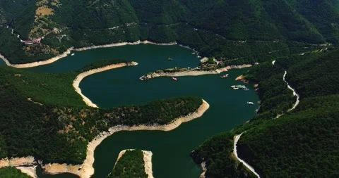 Slow River Stream Meandre Through Mountain Range Vibrant Aerial Cinematic Stock-Footage 300490792