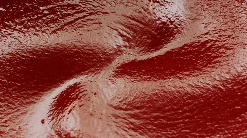 A slow rotating tomato sauce pool. Stock Footage 128964517