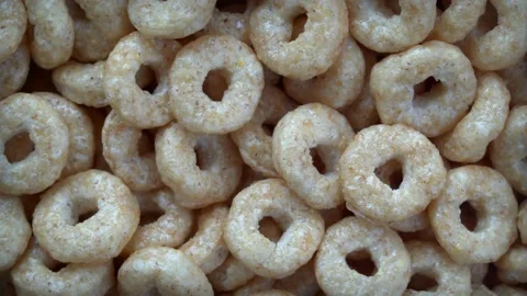 Slow rotation of cereal rings. Stock Footage 131401152