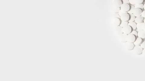 Slow rotation of white tablets on a white background with blank space for text Stock Footage 140483553