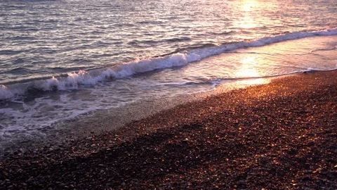 Slow sea wave at sunset Stock Footage 108523189