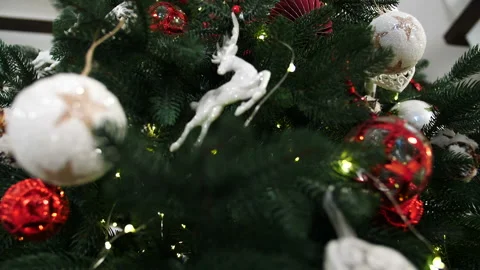 Slow shooting of Christmas tree decorations on the tree Stock Footage 166562760