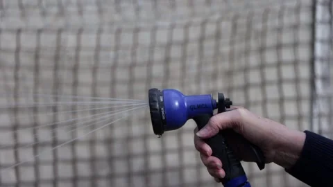 Slow showerjet watering Stock Footage 247407405