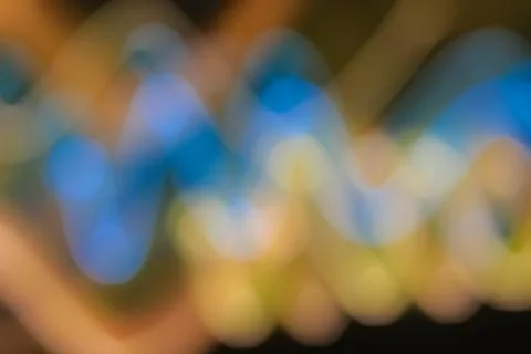 Slow Shutter Speed Creates Abstract Blurred Light Streaks with Blue and Gold  Stock Photos