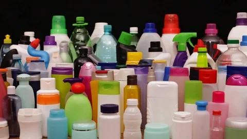 Slow slide and pan in front of usual plastic bottles Video stock 82781104