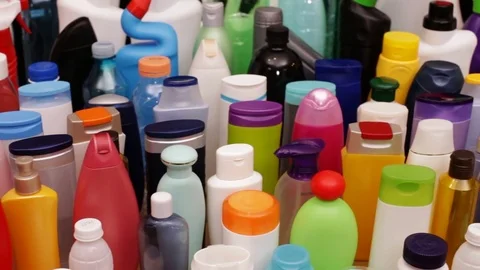 Slow slide in front of plastic bottles found in every household 動画素材 82797748