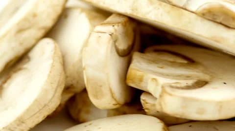 Slow slide from white to delicious isolated macro of sliced mushrooms in 4K. Stock Footage 47232589