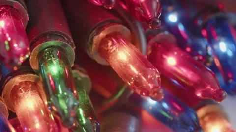 Slow sliding by bunch of string light bulbs 4K video Stock Footage 196094362