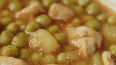 Slow sliding in front of pea stew 4K video Video stock 172252499