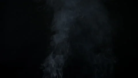 Slow smoke floating on black screen background Stock Footage 231033607