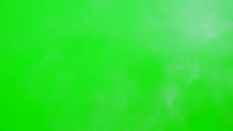 Slow smoke flow on green screen background Stock Footage 247203708