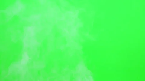 Slow smoke flow on green screen background Stock Footage 247204152