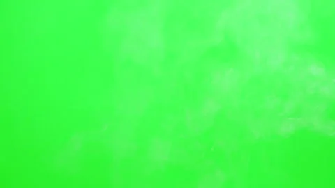 Slow smoke flow on green screen background Stock Footage 247204161