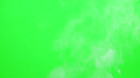 Slow smoke flow on green screen background Stock Footage 247204186