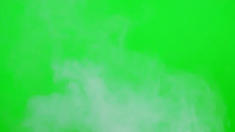 Slow smoke flow on green screen background Stock Footage 247204296