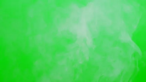 Slow smoke flow on green screen background Stock Footage 247204400