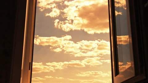 Slow smooth flight through the window. Golden sky. Stockbeeldmateriaal 162193855