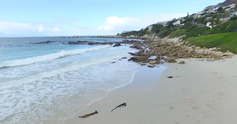 Slow, smooth foward flight over the shoreline - 4K Drone Footage Stock-Footage 65300874