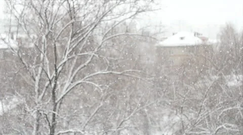 SLOW: The snowfall in the town Stock Footage 58606006