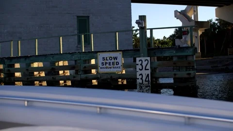 Slow Speed Minimum Wake Under Bridge Stock Footage 93758337