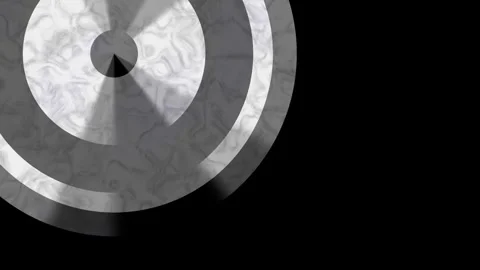 Slow spinning disc on dark background cinematic loop Stockbeeldmateriaal 335281017