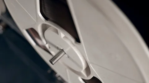 Slow spinning process of a tape bobbin Stock Footage 106836128