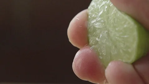 SLOW OF A SQUEEZE LEMON Stock Footage 107305512