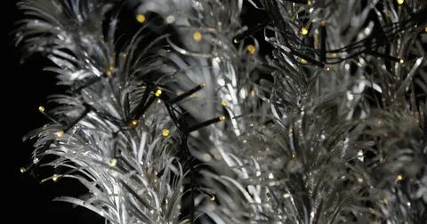 Slow Tilt Down Closeup of Plain Aluminum Christmas Tree Stock Footage 82706155