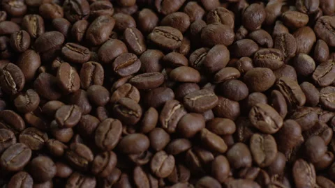 Slow Tilt Down over Coffee Beans 库存影片 142196072
