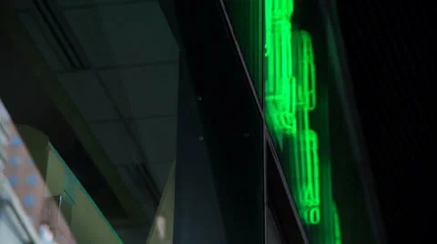 Slow tilt down of Times Square reflection Video stock 37388949