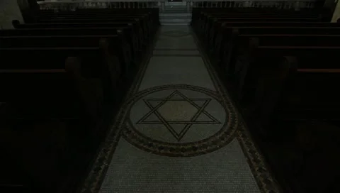 Slow tilt up interior of large Catholic church sanctuary Stock Footage 11142876