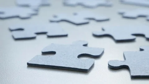 Slow tilt over problem solving toys arranged chaotically DOF Stock Footage 70421759