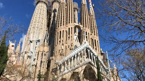 Slow Tilt Up Shot of La Sagrada Familia Basilica Cathedral in Barcelona Stock Footage