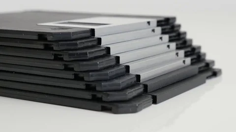 Slow tilt on stacked diskette data archives Stock Footage 75770624