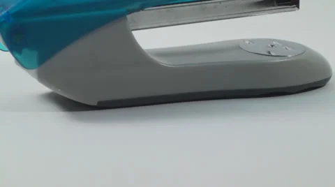 Slow Tilt Of A Stapler Isolated On White, Office, Business, Work Stock Footage 37553812