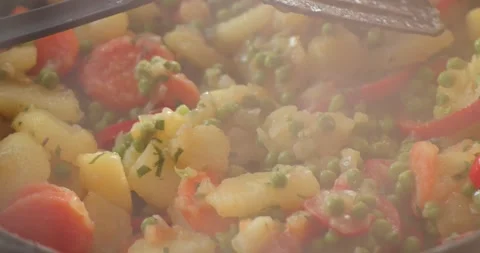 Slow tilting over vegetable meal 4K footage Stock Footage 299980715