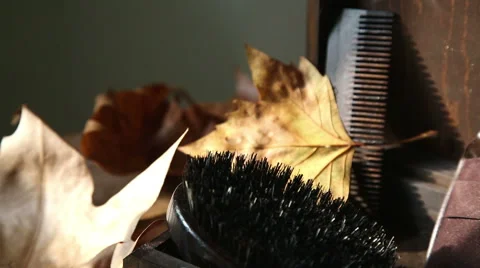 Slow tilting shot from brush to comb in a vintage kit of beauty beard men Stock-Footage 55769291