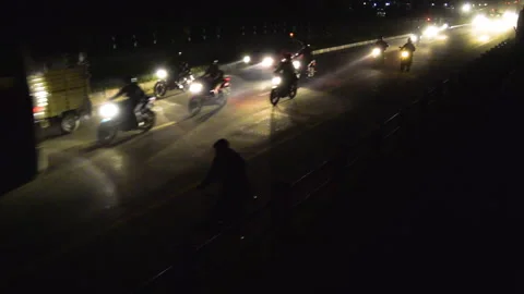 Slow Timelapse of huge traffic full of vehicles incoming in a highway at nig Stock Footage 248734755