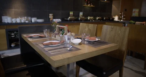 Slow Track of a Luxury Dining Space - Shot on Red 5K Stockbeeldmateriaal 93554145
