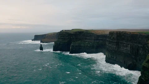 Slow Tracking Aerial of the Cliffs of Moher, Ireland Stock Footage 123441568