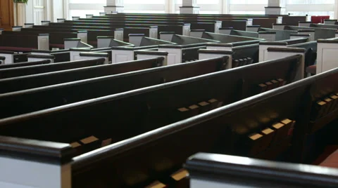 Slow tracking (dolly) shot along church pews Stock Footage 35401169