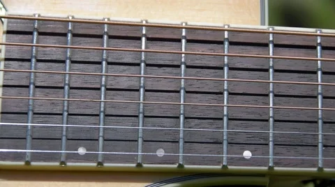 Slow Tracking Guitar Close Up Stock Footage 51661718
