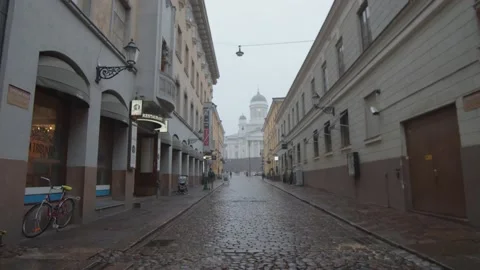 Slow tracking shot across empty street with Helsinki Cathedral in background Stock Footage 146290819