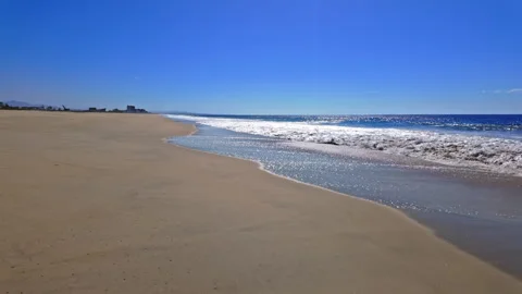 Slow tracking shot on a beach Stock Footage 265173029