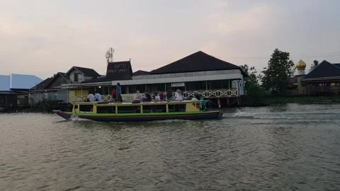 Slow tracking shot exploring by boat on a river 2 Stock Footage 249151746
