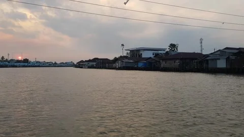 Slow tracking shot exploring by boat on a river 5 Stock Footage 249152689
