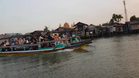 Slow tracking shot exploring by boat on a river Stock Footage 249153876