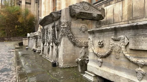 Slow tracking shot exploring the Roman sarcophagus with stone carvings Stock Footage 340154773