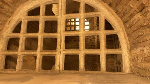 Slow tracking shot stone grid and vaulted brick architecture Stock Footage 340155139
